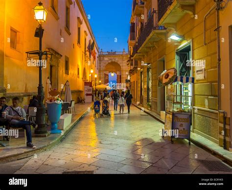 Italy Sicily Province of Trapani Marsala Old town Alley in the evening ...