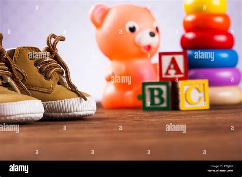 Pile of toys, collection on wooden background Stock Photo - Alamy