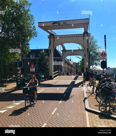 Amsterdam canal bridge Stock Photo - Alamy