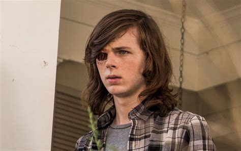 The Walking Dead: Carl 'might not die', despite zombie bite