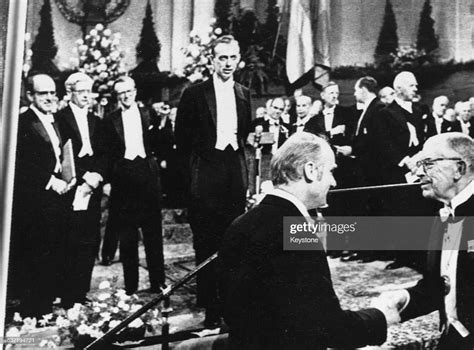 James Watson and Francis Crick accepting their Nobel Prize, for the... News Photo - Getty Images