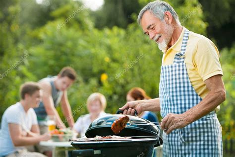 Family having a barbecue party — Stock Photo © alexraths #12067783