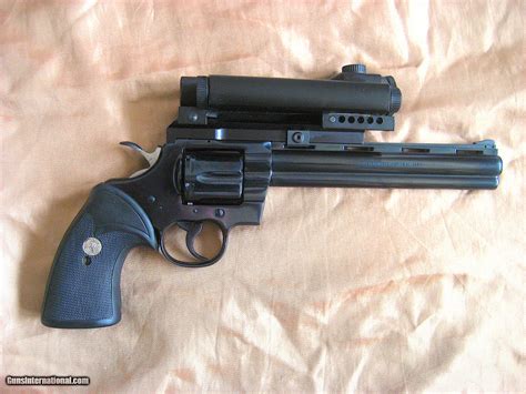 Colt Python Revolver with Aimpoint Laser Sight. .357 mag,