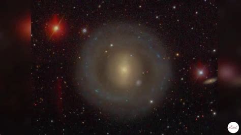 Hoag's Object is a rare ring galaxy. Another distant ring galaxy can be ...