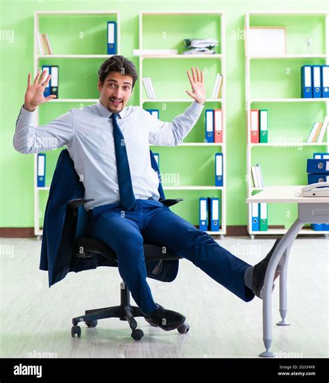 The employee doing exercises during break at work Stock Photo - Alamy