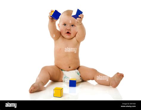 Curious baby playing looking up isolated on white Stock Photo - Alamy