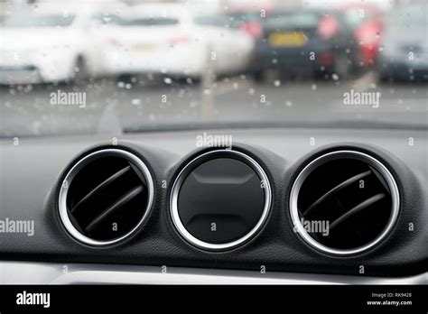 Car interior air vents three circular round on dashboard Stock Photo ...