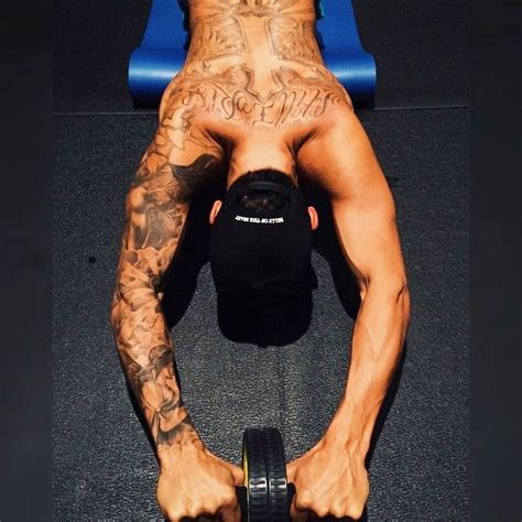 Decoding F1 star Lewis Hamilton's tattoos - Rediff.com Sports