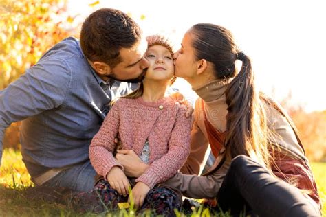 Family Walking in Autumn Park at Sunset Stock Image - Image of happiness, male: 131422915