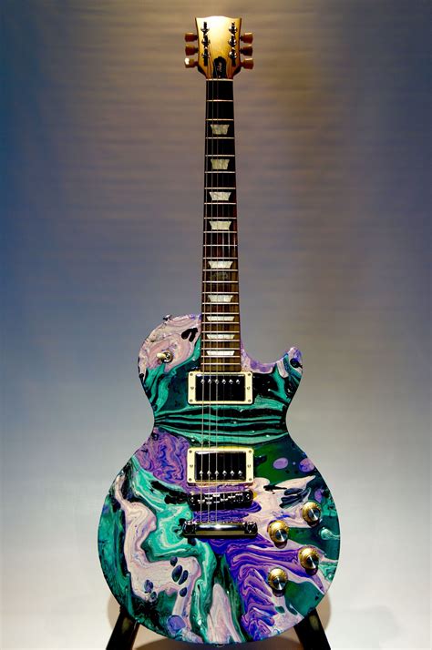 I've been playing around with this acrylic finish....not easy but very cool. | Guitar art, Cool ...