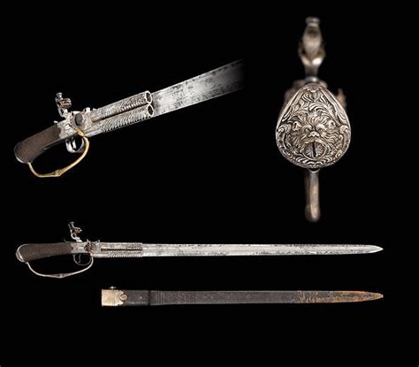 A double barrel flintlock sword pistol by H. W. Mortimer of London, 18th century [X-Post from /r ...