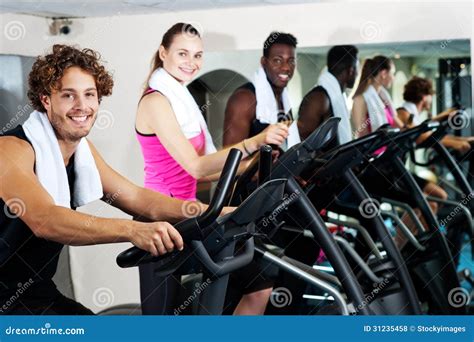 People At Gym Working Out Happily Royalty Free Stock Photos - Image: 31235458