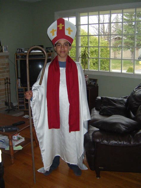 The perfect Bishop costume simply created. Notice the long tunic layered over a base of black ...