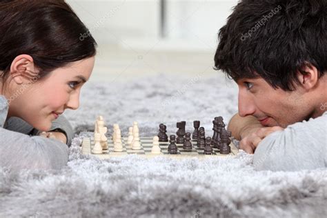 Man and woman playing chess Stock Photo by ©photography33 7133561