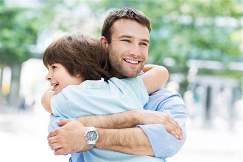 Father and son hugging stock photo. Image of fathers - 55475338