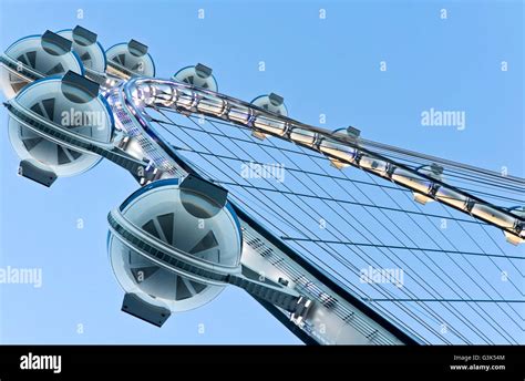 An unusual perspective of the observation cabins of the High Roller a 550-foot-tall Ferris wheel ...