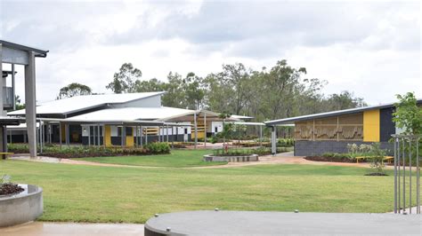 Town celebrates as school is finally opened | The Courier Mail