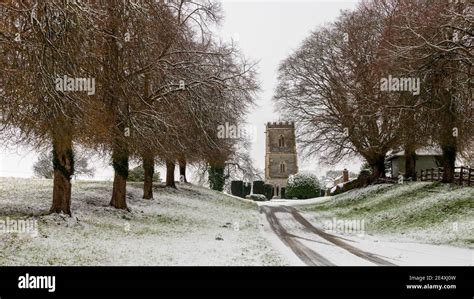 Village Church Snow Scene Stock Photo - Alamy