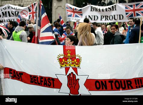 Belfast, UK. 5th Jan, 2013. A youth behind the Ulster Flag with "East ...