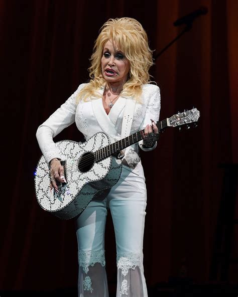 Dolly Parton Sings While Dollywood Burns | National Enquirer