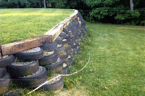 trees in tires - Google Search | Landscaping retaining walls, Diy garden, Garden landscape design