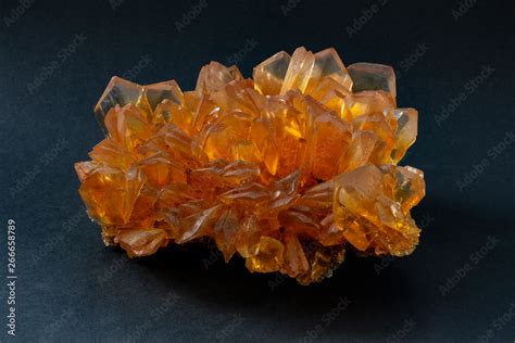 Orange Selenite Crystal Cluster, also known as satin spar, desert rose ...