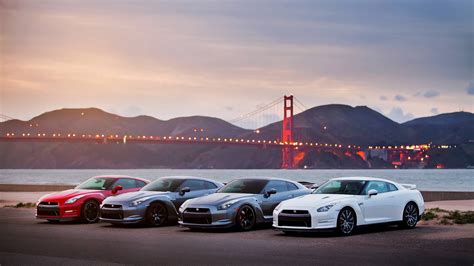 Download Nissan GTR Cars Parked Near The Sea Wallpaper | Wallpapers.com