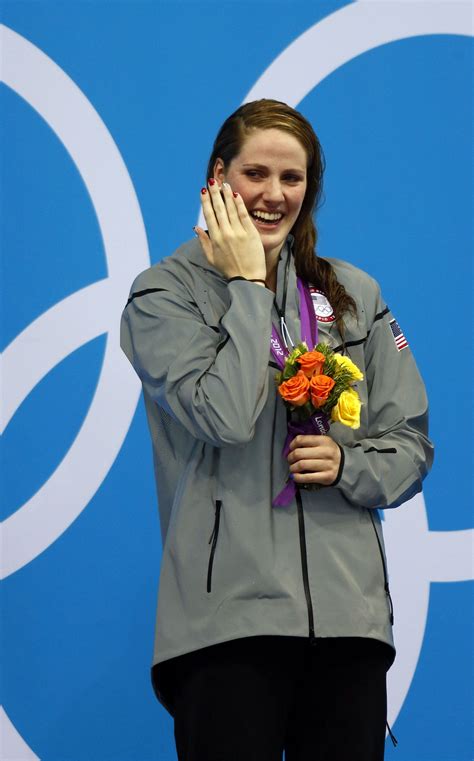 Missy Franklin stands on the podium after receiving her gold medal ...