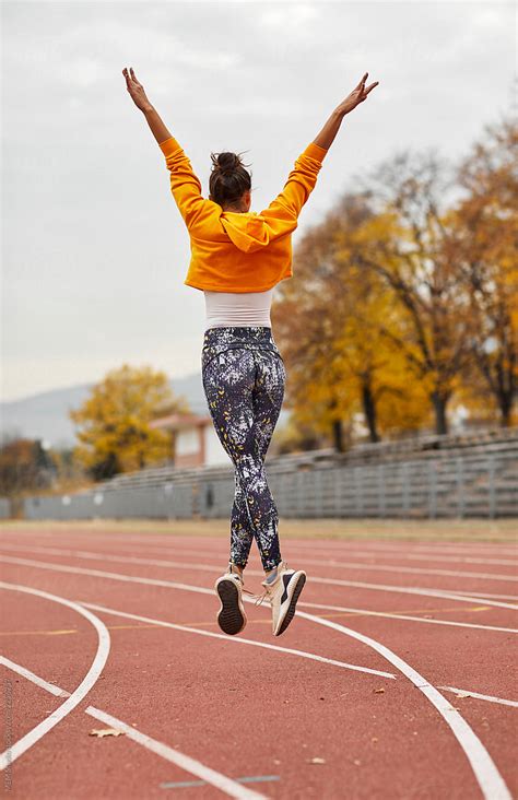 "Woman Training At A Running Track" by Stocksy Contributor "MEM Studio ...