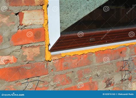 Close Up on Window Insulation with Spray Foam Insulation. Windows ...