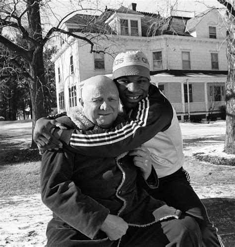 Boxing History - Legendary trainer Cus D'Amato outside his...