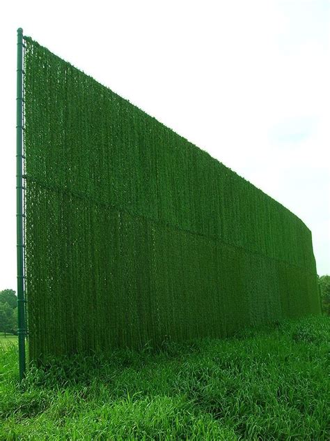 Chain Link Fence with Hedgelink Weave by Elyria Fence | Green fence ...