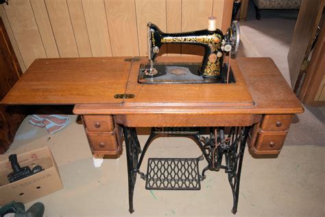 Circa 1907 Antique Singer Sewing machine model 66 with Treadle | InstAppraisal