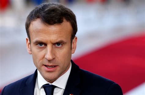 French President Emmanuel Macron briefs the media as he arrives at a ...