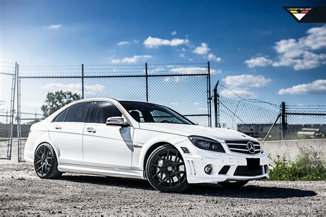 White Mercedes C Class Gets a Distinctive Appearance with Custom Matte Black Rims — CARiD.com ...