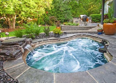 In Ground Hot Tub Cost Uk With Waterfall | Home Ideas | Hot tub, Inground hot tub, Patio design