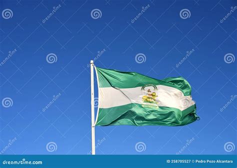 Andalusian Flag with a Blue Sky Stock Image - Image of flagpole, flying: 258705527