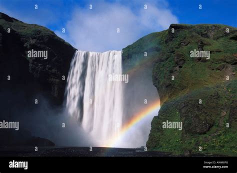 Rainbow over Skogafoss Waterfall, Iceland, Atlantic Ocean Stock Photo ...