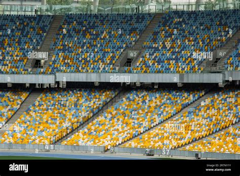 soccer stadium inside view. football field, empty stands, a crowd of ...