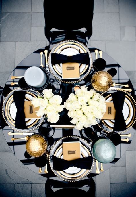 Black and gold tablescape | Rehearsal Dinner Ideas | Pinterest