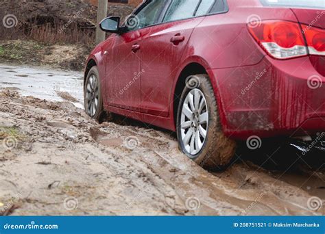 Car Stuck in the Mud Car Wheel in Dirty Puddle Rough Terrain Stock ...