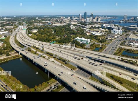 Aerial view of american freeway intersection with fast moving cars and ...