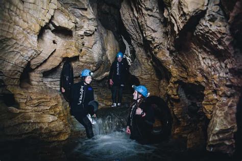 Waitomo Caves Black Labyrinth Black Water Rafting Experience | GetYourGuide