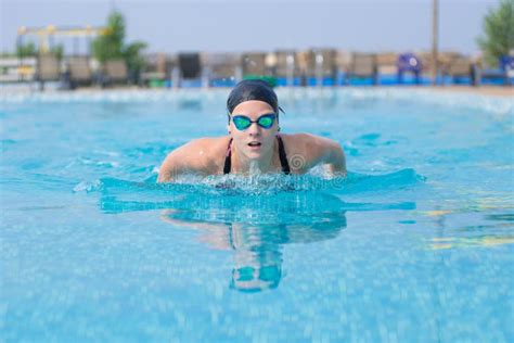 Young Girl Swimming Butterfly Stroke Style Stock Photo - Image of ...