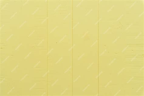 Premium Photo | Pastel bright yellow wooden table background texture