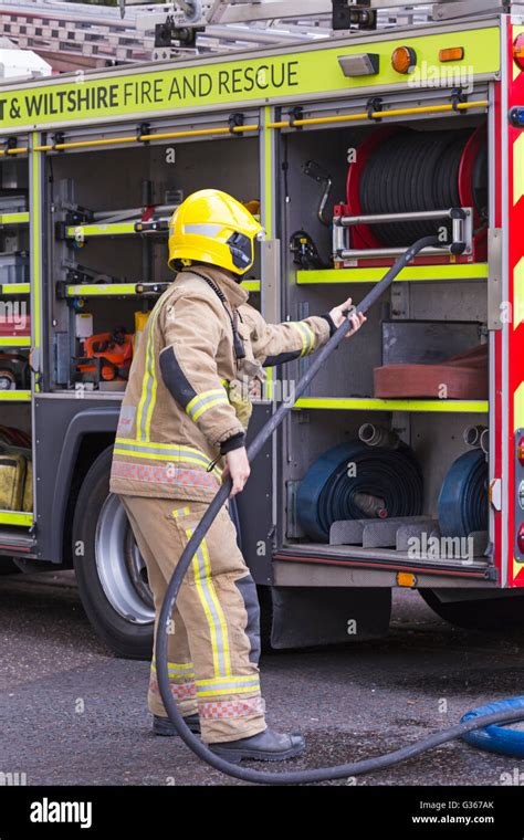 Dorset & Wiltshire Fire and Rescue firemen at scene of fire at ...