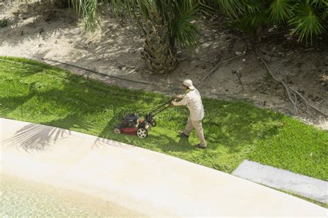 A Mexican Gardener with Lawn Mower Editorial Photography - Image of lawnmower, horizontal: 232419282