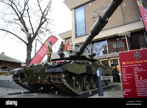 Soldiers from The King's Royal Hussars display a Challenger 2 tank ...