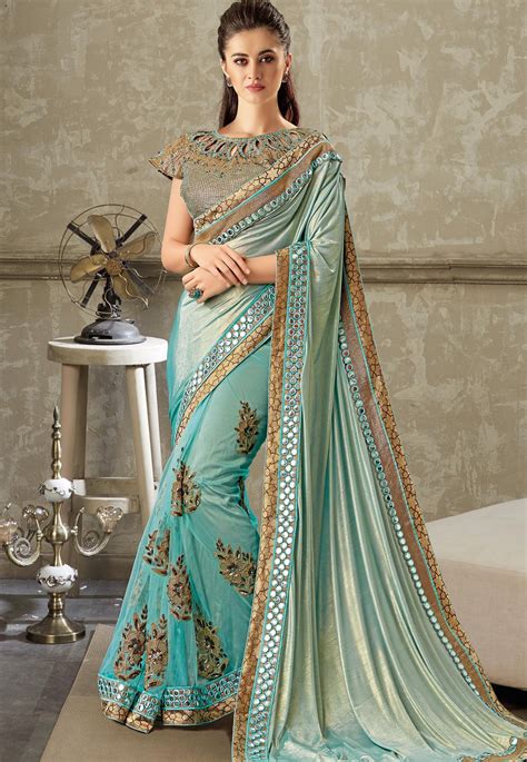 sky blue embroidered lycra net saree with brocade blouse 10716