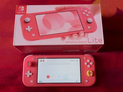 Nintendo Switch Lite Coral Pink 128GB, Video Gaming, Video Game Consoles, Nintendo on Carousell